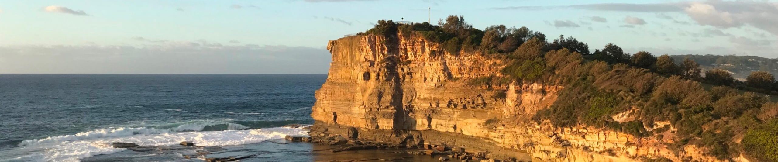 rocks jutting out into sea